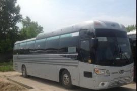 Перевозка людей на автобусе Neoplan